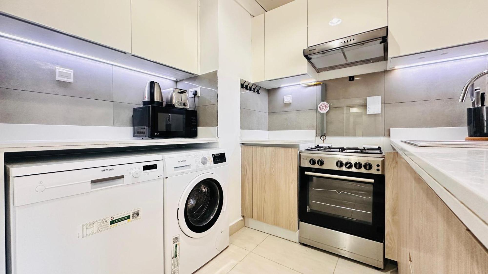 Oyo 1366 Standard One Bedroom Jvc Apartamento